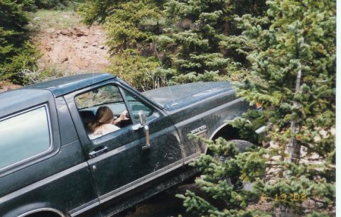1990 Ford Bronco - My girlfriend seen holding on for her life. As i bend my exaust pipes backing down this hill.