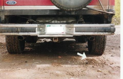 1990 Ford Bronco - Pile of dirt from my exaust, and my bent pipes