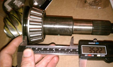 1990 Ford Bronco - Measuring a differential pinion gear and bearing with digital calipers.