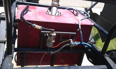 1992 Ford Ranger - Close-up view of a custom-installed fuel tank and associated plumbing, likely for a modified vehicle.