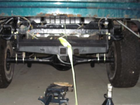 1979 Ford Bronco - The rear axle and suspension components are visible on this vehicle, along with a tow hitch receiver.