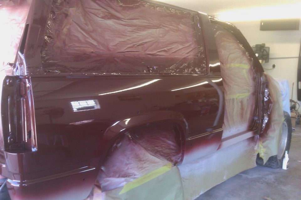 1994 Chevrolet Blazer side view, covered in masking for paint