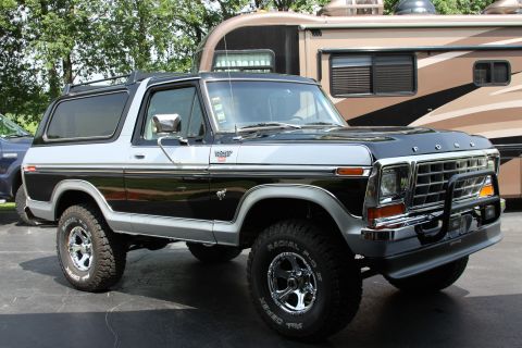 1979 Ford Bronco - This 1979 Ford Bronco is parked in front of an RV.