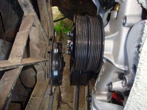 1989 Ford Bronco - Close-up view of engine pulleys and fan, with the number '270' visible on the fan shroud.