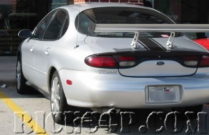 1997 Ford Taurus - This car is a Ford Taurus, but it is not a 1997 model. The body style indicates it is from the late 1990s or early 2000s.