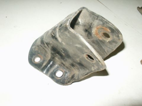 1990 Ford Bronco - A single metal bracket is shown, with visible rust and mounting holes.