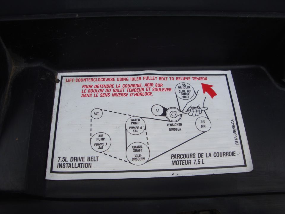 Ford 7.5L drive belt installation routing label showing pulleys and belt path