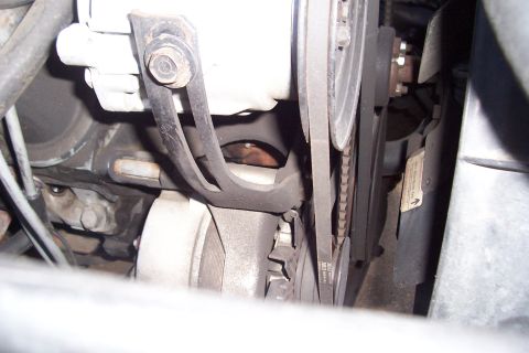1988 Ford Bronco - Close-up view of the engine's belt and pulley system.
