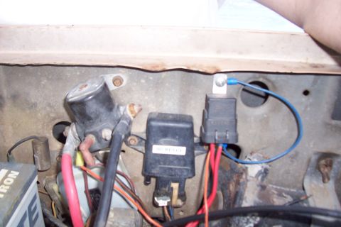 1988 Ford Bronco - Engine bay electrical components including starter solenoid, fuse box, and relays are shown in this close-up view.