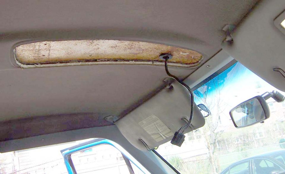 This is starting half way into the installation of my Eddie Bauer Over Head Console in my 1983 Brionco.  I didn't think to take pictures of the cable routing.   However, it is routed just under the top trim piece and down along the A-Post to under the dash area.  All I received with this console was the connector with a couple inches of wire.  So, I  spliced in wire long enough to reach where I could make the appropriate connections.