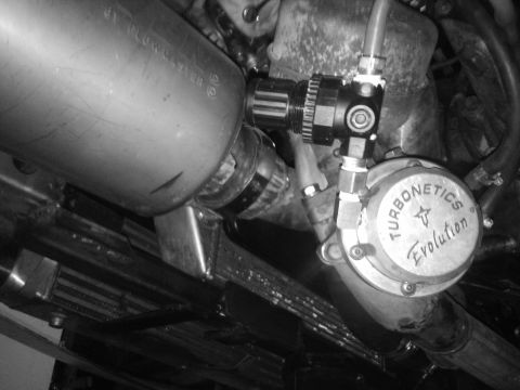 1995 Ford Probe - This image shows aftermarket turbocharger and exhaust system parts, not a 1995 Ford Probe.