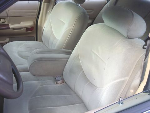 1998 Ford Crown Victoria - Interior view of a 1998 Ford Crown Victoria, focusing on the front seating area.