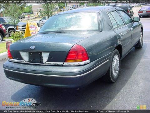 1998 Ford Crown Victoria - Rear view of a dark green 1998 Ford Crown Victoria police interceptor.