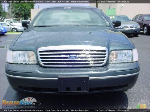 1998 Ford Crown Victoria - Front view of a 1998 Ford Crown Victoria Police Interceptor, dark green satin metallic finish.
