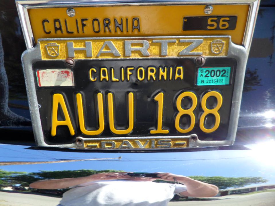 California license plate from 1956, with 'AUU 188' and 'Hartz' visible