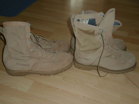 1992 Ford Mustang - A pair of Belleville boots sits next to a pair of Bates boots on a wood floor.