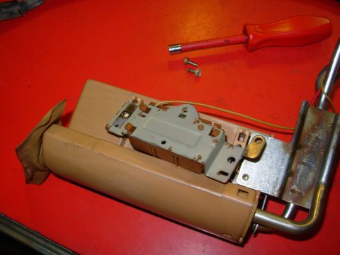 1983 Ford Bronco - Flip the sender for access to its clips.
