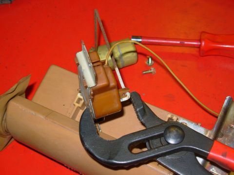 1983 Ford Bronco - After reassembling the rheostat board, sender housing, wiper arm, & backing plate, press the arm back into the wiper clip. It may be necess…
