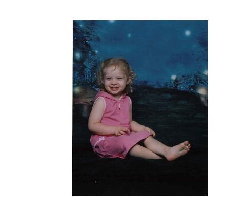 1987 Ford Bronco - A young child sits on a dark surface against a blue, starry backdrop.