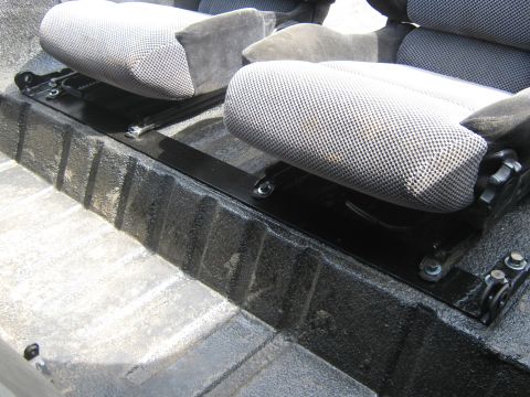 1978 Ford Bronco - Bucket seats installed in the bed of a pickup truck.