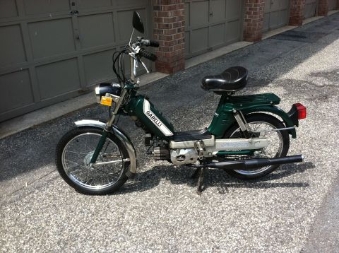 1981 Garelli Rally Sport - This green Garelli moped features a white stripe on its side and appears to be a Rally Sport model.