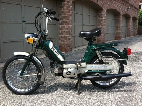 1981 Garelli Rally Sport - Green moped with chrome fenders and 'GARELLI' branding on the fuel tank.