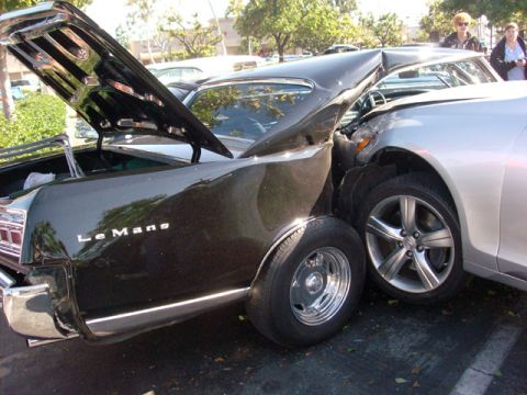 2007 Ford Mustang - Black car with trunk open and