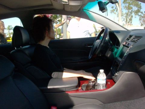 2007 Ford Mustang - The interior of a Lexus GS is shown, with a woman seated in the driver's position.
