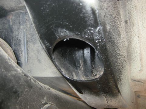 1978 Ford Bronco - Close-up view of undercarriage components, revealing structural elements and signs of use.