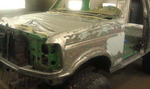 1995 Ford Bronco - This 1995 Ford Bronco is in the process of body repair, with primer and body filler visible on the front panels.