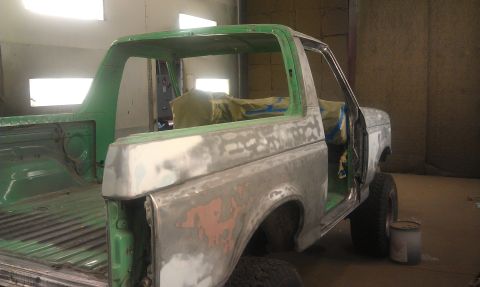 1995 Ford Bronco - This Ford Bronco is undergoing bodywork and appears to be in a paint booth.