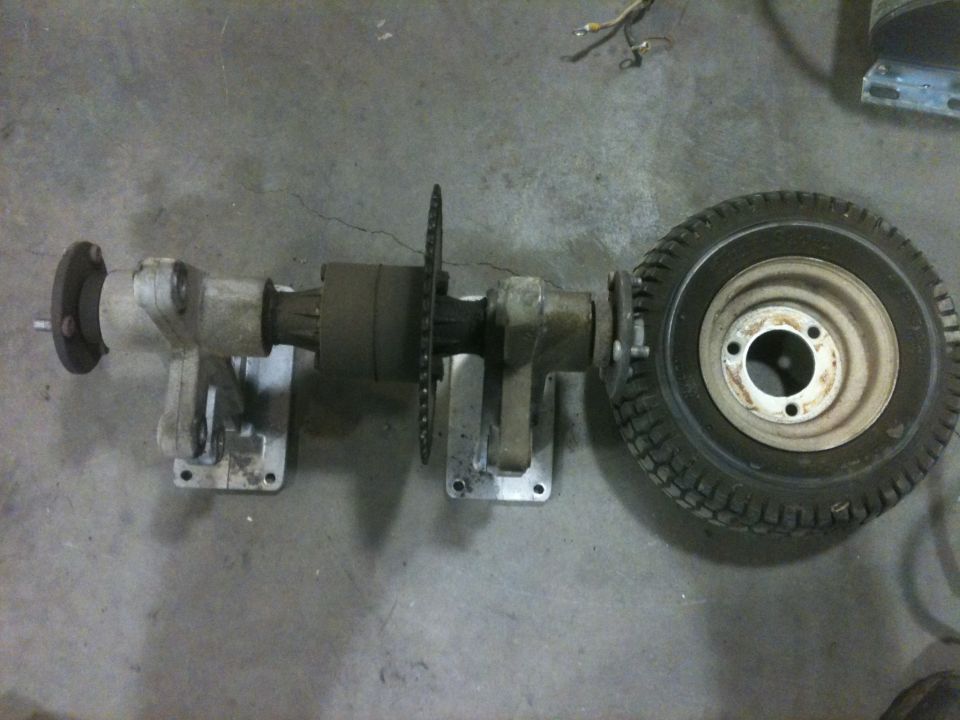 Rear axle assembly with chain and wheel