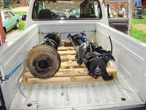 1995 Ford F-150 - axles in the bed of the truck ready to be unloaded.