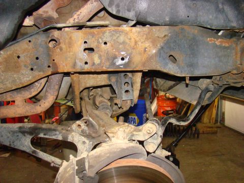 1995 Ford F-150 - started on the front. shocks, springs, brake lines and buckets off.