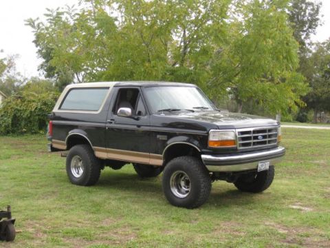 1994 Ford Bronco - This 1994 Ford Bronco features a two-tone paint scheme and lifted suspension.