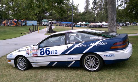 1990 Ford Probe - This 1990 Ford Probe is set up for racing, prominent sponsor decals and the number 86 on its side.