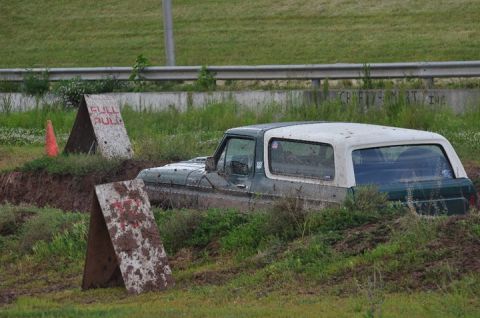 1979 Ford Bronco - This vehicle appears to be stuck in a mud pit, possibly during an off-road event.