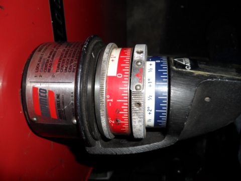 1973 Ford Ranchero - A close-up view of an automotive alignment gauge, showing its intricate measurement dials and calibration markings.