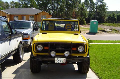 1974 Ford Bronco - This 1974 Ford Bronco is presented in a bright yellow paint scheme with a custom front bumper and auxiliary lighting.