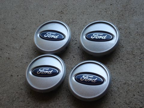 2000 Ford Crown Victoria - Set of four Ford center caps with blue and silver logos.