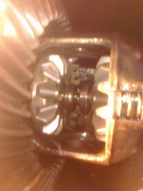 1995 Ford Bronco - Close-up view of differential gears, with a watermark for Supermotors.net visible at the bottom.