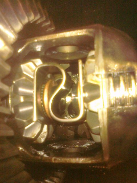 1995 Ford Bronco - Differential gears are visible in this close-up mechanical view.
