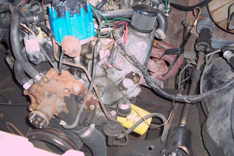 1988 Ford Bronco - Close-up view of an engine bay, showing various components and wiring.
