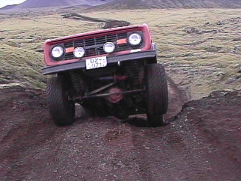 1974 Ford Bronco - This 1974 Ford Bronco is tackling a challenging off-road course.