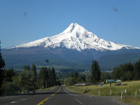 2005 Jeep Wrangler - A scenic view of Mount Hood from a highway on a sunny day.