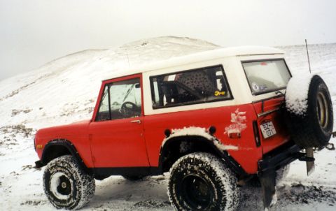 1974 Ford Bronco - This 1974 Ford Bronco is seen in a snowy landscape, equipped for off-road conditions.