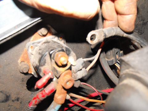 1986 Ford Bronco - Here's the 2 gauge, stock starter cable being removed from the top post in preparation for mounting it onto the lower (always hot) post. Th…