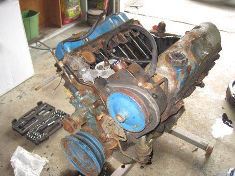 1979 Ford Bronco - V8 engine on an engine stand, showing its various components and signs of wear.