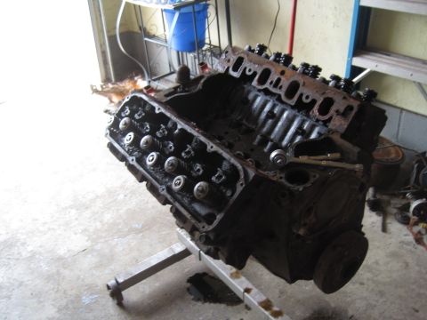 1979 Ford Bronco - Engine block on an engine stand, likely removed for rebuild or repair.
