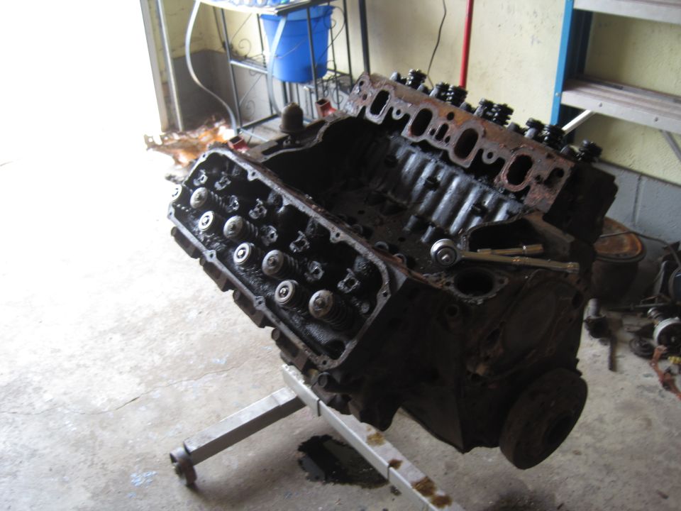 Engine block on an engine stand, appears to be a V8